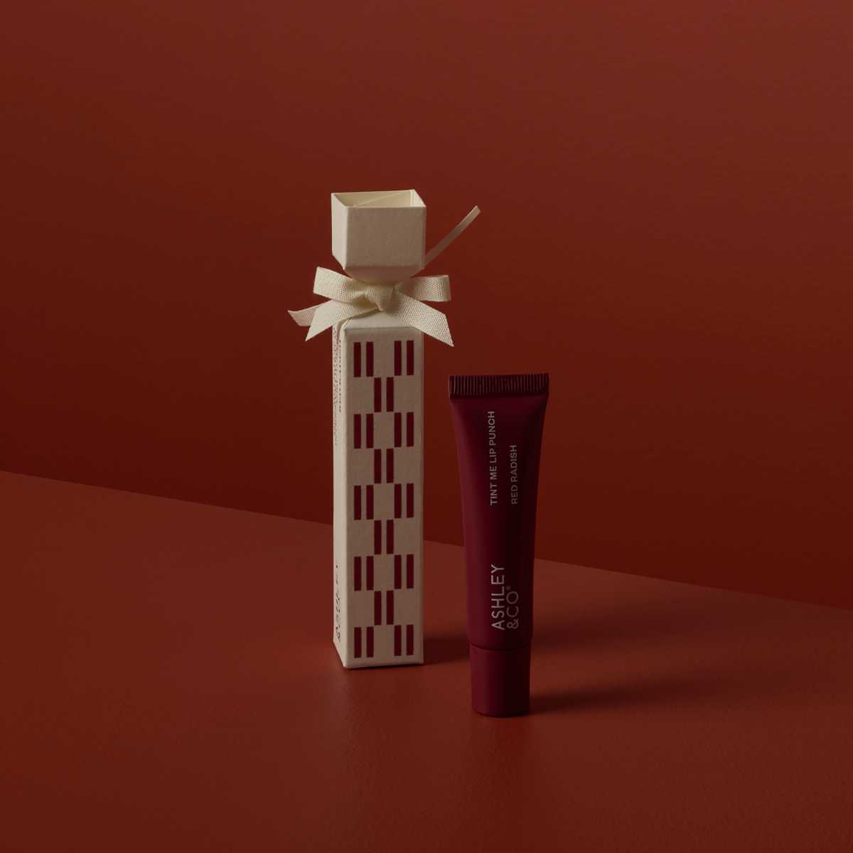 Dark Red Ashley & Co Christmas 2026 Mini Cracker Lip Punch